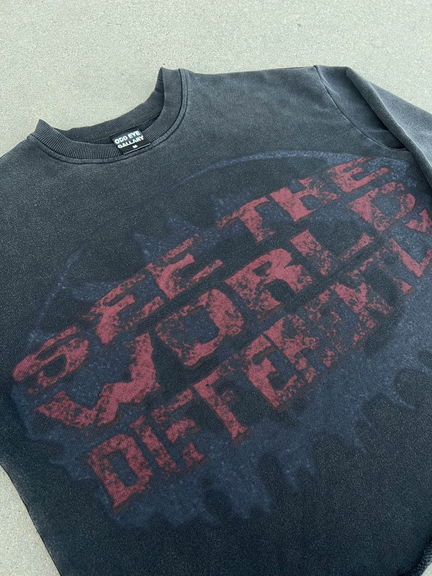 SEE THE WORLD DIFFERENTLY SWEATER