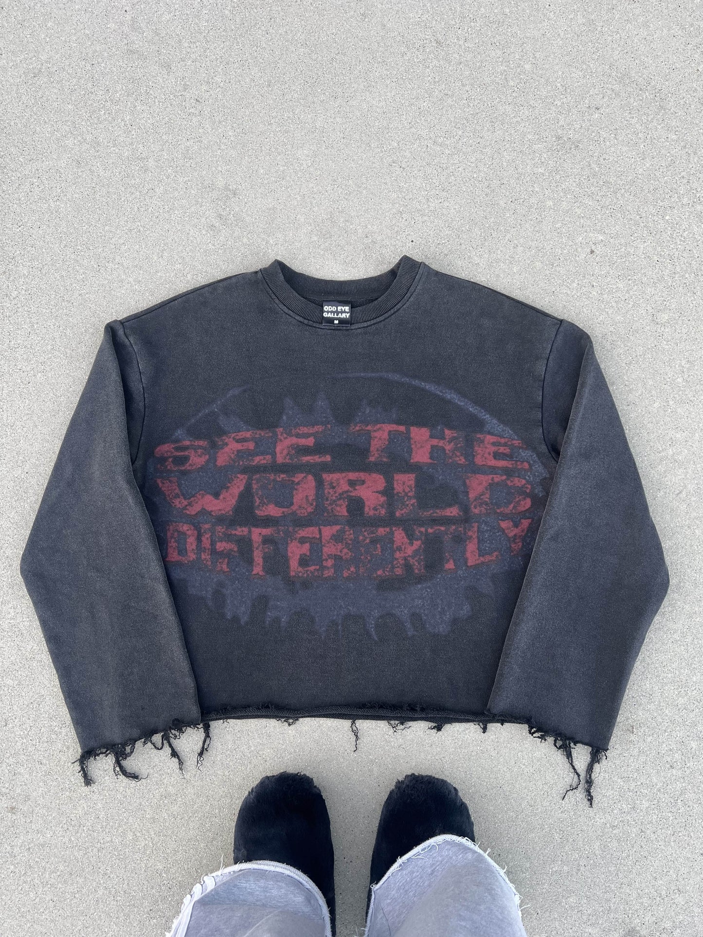 SEE THE WORLD DIFFERENTLY SWEATER